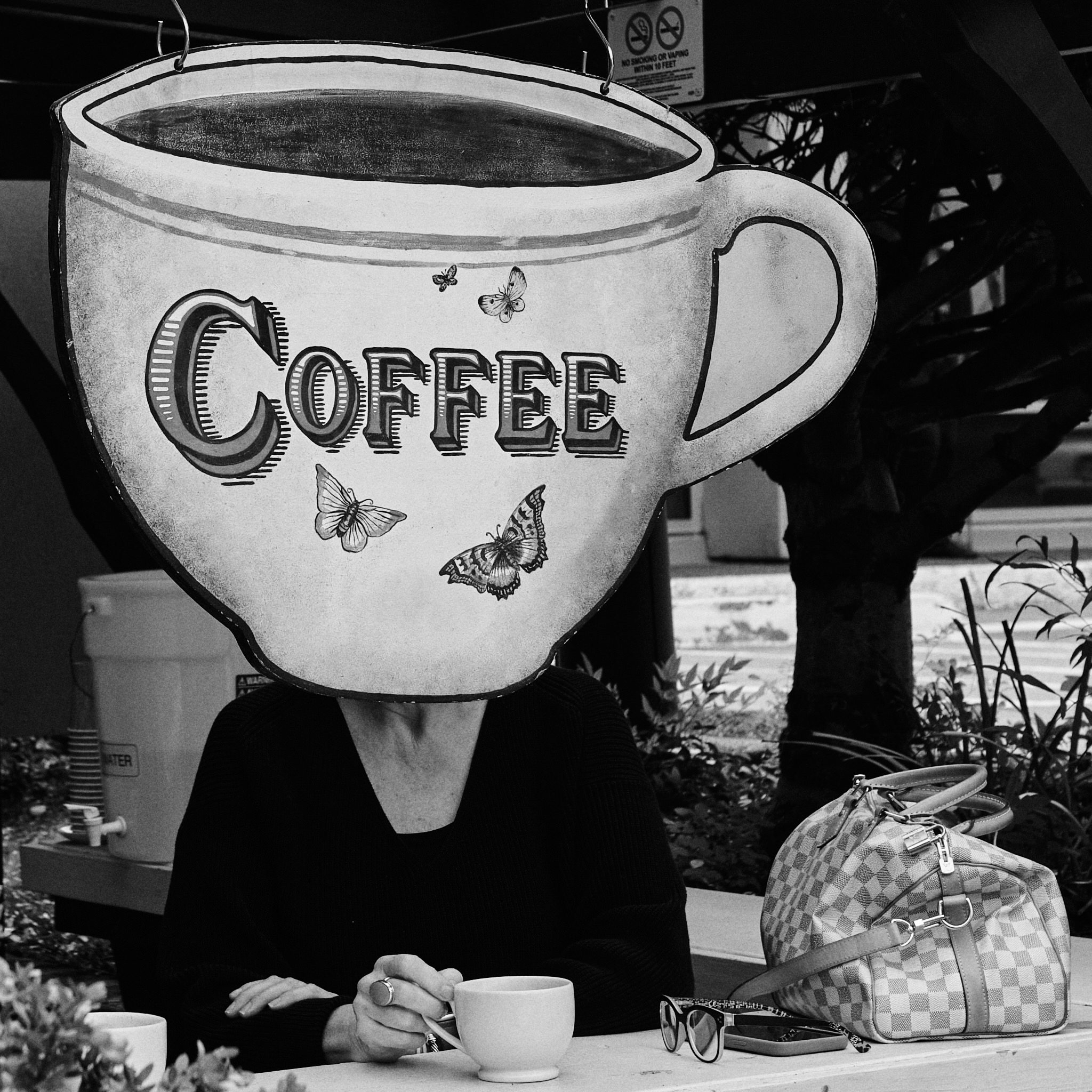 Playful candid street observation centered on daily morning coffee rituals and spontaneous urban wit