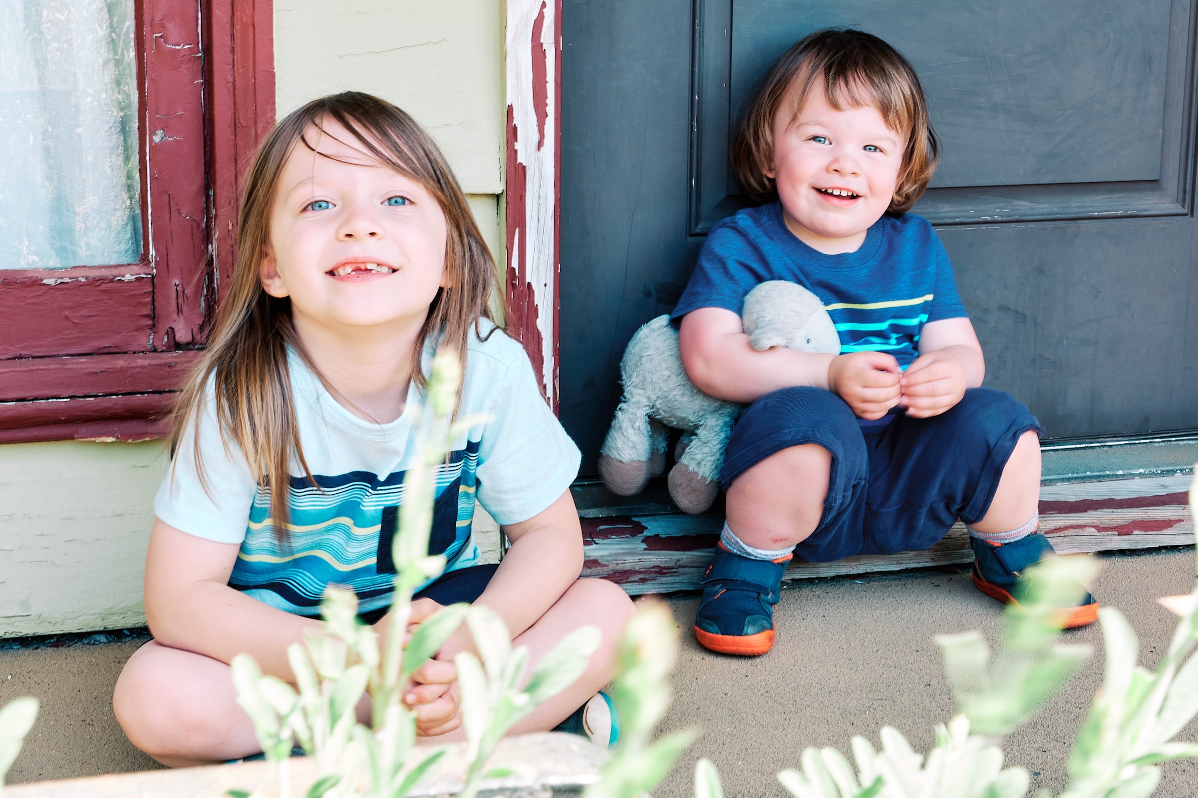 Joyful outdoor family portrait embracing spontaneous laughter and connection in Portland Oregon