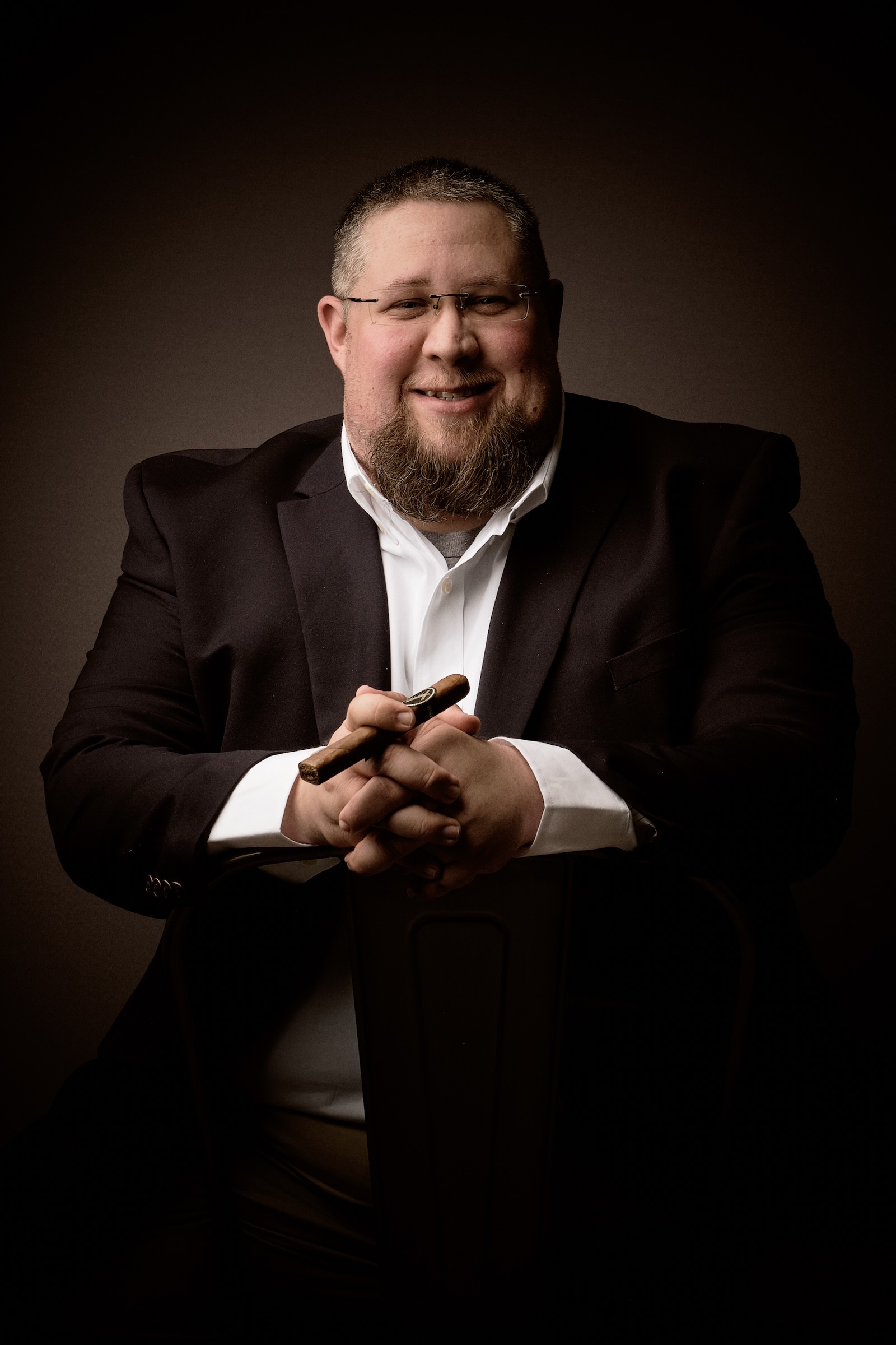 Classic portrait emphasizing quiet strength and authentic character